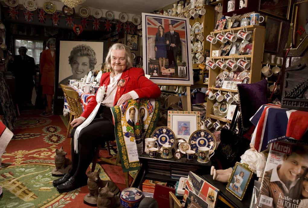 Margaret Tyler, poses with her collection of Royal memorabilia in the country at her home in Wembley, London. Tyler has amassed the largest collection of Royal memorabilia in England, including items for the wedding of Prince William and Kate Middleton.