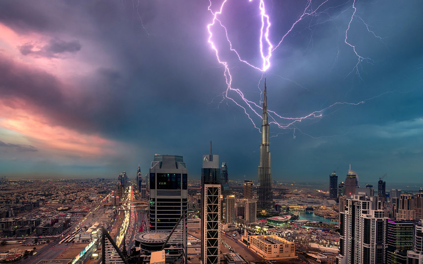 The world's tallest building the Burj Khalifa in Dubai, United Arab Emirates, is hit by a lightning bolt